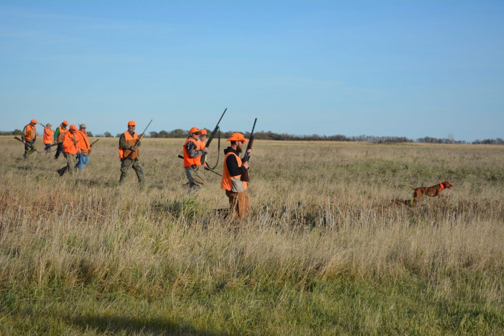 hunters in field